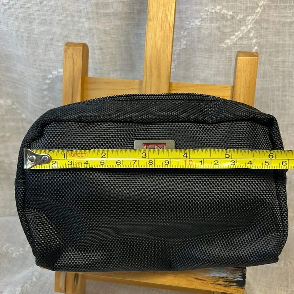 TUMI new never used cosmetic bag with some goodies